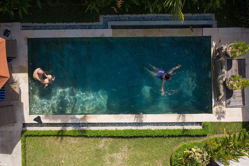 family relax in poolvilla